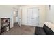 Bright bathroom features a double sink vanity, patterned shower curtain, and modern fixtures at 187 Ashley Woods Ct, Clayton, NC 27527