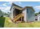 Exterior view of the back of the house, featuring neutral siding at 187 Ashley Woods Ct, Clayton, NC 27527