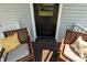 Wooden stairs leading to a backyard deck with string lights under the decking at 187 Ashley Woods Ct, Clayton, NC 27527