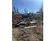 View of debris and dilapidated building at the property at 1916 E Hughes Mill Rd, Burlington, NC 27217