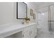 Bathroom featuring a granite vanity and shower-tub combo at 20 Meadowcrest Dr, Durham, NC 27703