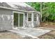 Rear exterior with siding, sliding glass door, and patio at 20 Meadowcrest Dr, Durham, NC 27703
