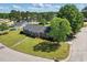 Charming brick home with a covered front porch and well-maintained landscaping at 203 Marlowe Dr, Dunn, NC 28334
