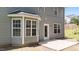 Back of house featuring a patio and bay window at 204 Trevor Ridge Dr, Holly Springs, NC 27540
