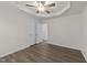 Bedroom featuring hardwood floors and double door closet at 204 Trevor Ridge Dr, Holly Springs, NC 27540