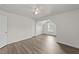 Upstairs bedroom with hardwood floors and natural light at 204 Trevor Ridge Dr, Holly Springs, NC 27540