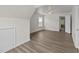 Upstairs bedroom with hardwood floors and dormer window at 204 Trevor Ridge Dr, Holly Springs, NC 27540