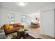 Open-concept living and dining area with a smooth transition between spaces for easy gatherings at 205 S Pettigrew St, Raleigh, NC 27610