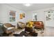 Bright and airy living room featuring stylish decor and new flooring throughout the house at 205 S Pettigrew St, Raleigh, NC 27610
