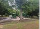 Playground includes multiple slides, climbing structures, and swings, perfect for  at 205 S Pettigrew St, Raleigh, NC 27610