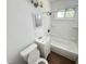 Standard bathroom with tub, toilet, and sink at 2131 Dandridge Dr, Raleigh, NC 27610