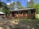 Exterior front view of the brick home, complete with porch at 2131 Dandridge Dr, Raleigh, NC 27610