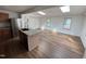 View of home's hardwood flooring, skylights, and stainless steel appliances at 2131 Dandridge Dr, Raleigh, NC 27610