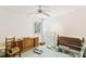Bedroom with a ceiling fan, window and furniture at 2308 Stonesthrow Ct, Raleigh, NC 27610