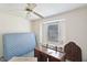 Bedroom featuring a large mattress, a desk, and a window at 2308 Stonesthrow Ct, Raleigh, NC 27610