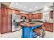 Spacious kitchen with stainless steel appliances, an island with seating, and abundant cabinet storage at 233 Hein Dr, Clayton, NC 27527