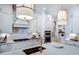 Gourmet kitchen boasting white cabinetry, stainless steel appliances, and a spacious island at 249 Lindo Johnson Rd, Pittsboro, NC 27312