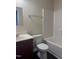 Standard bathroom featuring a toilet, sink with vanity, and shower over tub combo at 2612 Beagle Landing Dr, Raleigh, NC 27610