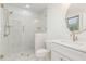 Updated bathroom featuring a white vanity and new shower with frameless glass doors at 2712 Nc 57, Hillsborough, NC 27278