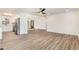 Spacious open-concept living room and kitchen featuring luxury vinyl plank flooring and recessed lighting at 2712 Nc 57, Hillsborough, NC 27278