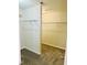 A spacious walk-in closet includes carpeted floors and multiple shelves for optimal storage space at 2902 Framer Ln, Durham, NC 27704