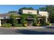 Charming retail space with lush greenery, featuring an inviting entrance and well-maintained landscaping at 3008 Eden Harbor Ct, Raleigh, NC 27613