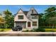 Charming two-story home with a gray two-car garage and manicured lawn at 3008 Eden Harbor Ct, Raleigh, NC 27613