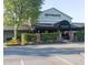 Exterior view of Margaux's Restaurant with outdoor seating and well-maintained landscaping at 3008 Eden Harbor Ct, Raleigh, NC 27613