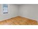 Bedroom features wood flooring and natural light at 306 Coleman St, Oxford, NC 27565