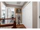 Upstairs hallway with hardwood floors and a view of the staircase at 309 Cross Hill Ln, Holly Springs, NC 27540