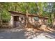 Rustic beer shack with vintage decor and wooded surroundings at 3123 Brassfield Rd, Creedmoor, NC 27522