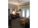 A cozy living room with hardwood floors, comfortable seating, and natural light at 3123 Brassfield Rd, Creedmoor, NC 27522