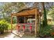 Rustic outdoor bar area with a charming, unique design at 3123 Brassfield Rd, Creedmoor, NC 27522