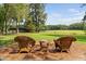 Outdoor seating area on a well maintained lawn at 3123 Brassfield Rd, Creedmoor, NC 27522