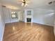 Inviting living room with hardwood floors, a fireplace, and an open layout at 358 Red Elm Dr, Durham, NC 27713