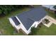 An aerial view of a home with a dark roof at 400 Southerby Dr, Garner, NC 27529