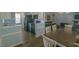 The kitchen has black appliances, and opens to the living area with the dining room table at 400 Southerby Dr, Garner, NC 27529