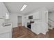 Modern kitchen with stainless steel appliances and bright white cabinetry at 407 Whitehall Ct, Clayton, NC 27520