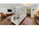 Bright living room featuring hardwood floors, sectional sofa, and stylish decor at 4112 Huckleberry Dr, Raleigh, NC 27612
