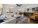 Open concept living room flows into the modern kitchen and dining area at 4112 Huckleberry Dr, Raleigh, NC 27612