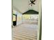 Screened back porch with ceiling fan and wood decking at 425 Price Ave, Durham, NC 27707