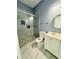 Updated bathroom with glass shower, modern toilet and sink, and stylish finishes at 425 Price Ave, Durham, NC 27707