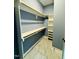 Spacious walk-in closet featuring organized shelving and rods at 425 Price Ave, Durham, NC 27707
