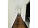 Long hallway with views to an eating area and a bathroom at 425 Price Ave, Durham, NC 27707