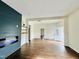 Spacious living room boasting hardwood floors, a stylish fireplace, and an inviting open floor plan at 425 Price Ave, Durham, NC 27707