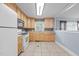 Kitchen showcasing countertops, an oven, and plenty of wood cabinetry for storage at 464 Camp Rd, Burlington, NC 27217