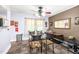 Cozy dining area featuring a glass table, unique chairs, and natural light at 509 Stokes Rd, Graham, NC 27253