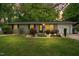 Charming one-story home with landscaped front yard, flowerbeds, and a one car garage at 509 Stokes Rd, Graham, NC 27253