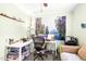 Bright home office featuring dual monitors, a comfortable chair, and natural light for an efficient workspace at 509 Stokes Rd, Graham, NC 27253