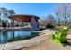 Outdoor amphitheater overlooking a water feature in a park-like setting, with lawn chair at 512 Page St, Cary, NC 27511